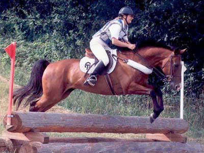 Allegra Steck jumping in competition